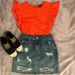 Reddish orange short sleeve blouse